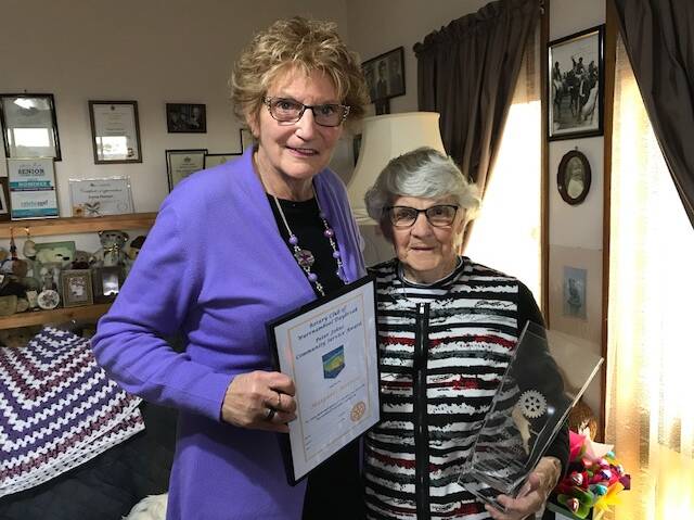 Selfless: Warrnambool Daybreak Rotary Club committee member Cheryl Bellman presents Margaret Morton with the Peter Johns' Community Service Award. The 90-year is an  active volunteer in the community. 