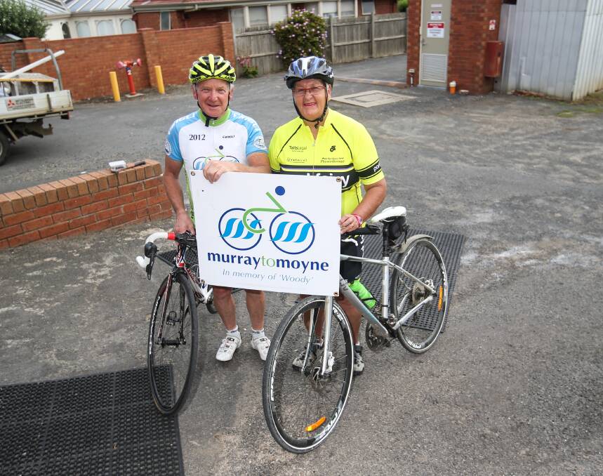 Annual event: Echuca leg ride director Jeff McLean and committee member Hester Woodrup prepare for this weekend's Murray to Moyne cycling relay. Picture: Amy Paton