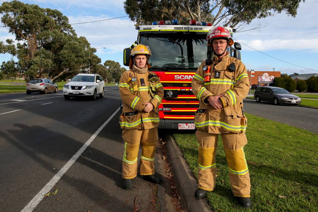 Slow down: Warrnambool CFA firefighter Scott Lilley and senior station officer Greg Kinross have welcomed the soon to be introduced reduced speed limit around emergency vehicles. Picture: Rob Gunstone