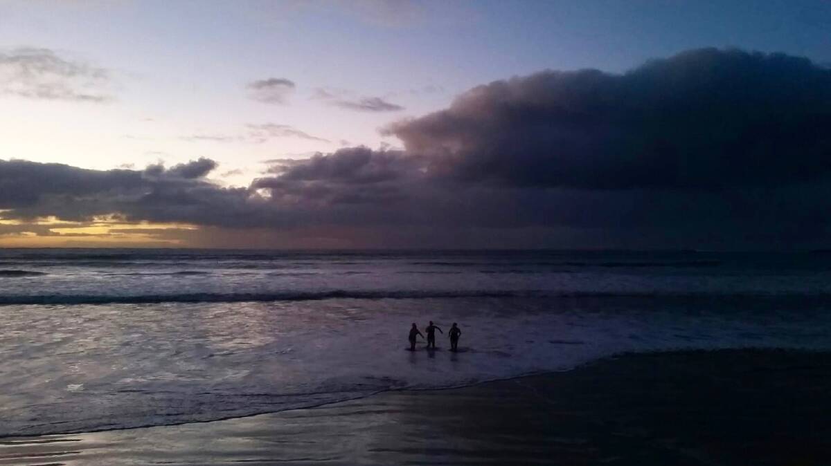 Awake now: Port Fairy residents and visitors braved chilly waters for an early morning swim at East Beach on Saturday. The Winter Solstice Swim was part of the Winter Weekends Festival and attracted about 65 people.