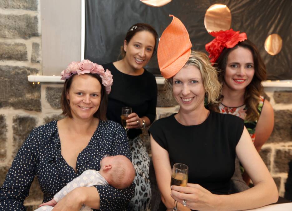 Fundraiser: Jessica Taylor, with son Edward, Renae Taylor, Sasha Hayes and Bree Taylor, all of Port Fairy, at the 2016 Heather Holcombe Memorial Melbourne Cup Day Luncheon in Port Fairy. Picture: Rob Gunstone