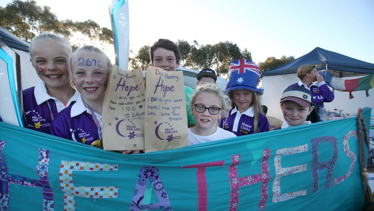 Heroes: Three generations participated in the Relay for Life team Heather's Heroes, in memory of  Heather Worrall who died from liver cancer in 2011. Picture: Amy Paton