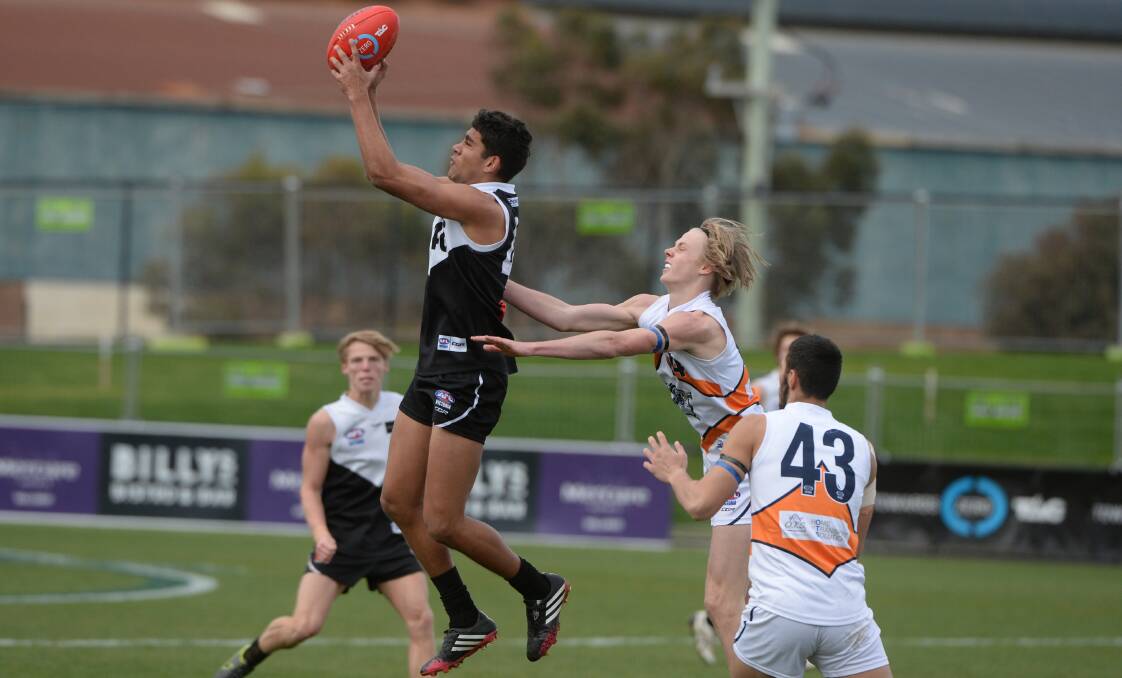 FLYING HIGH: Camperdown footballer Cedric Cox has caught AFL scouts' attention since joining North Ballarat Rebels. Picture: Kate Healy, The Courier