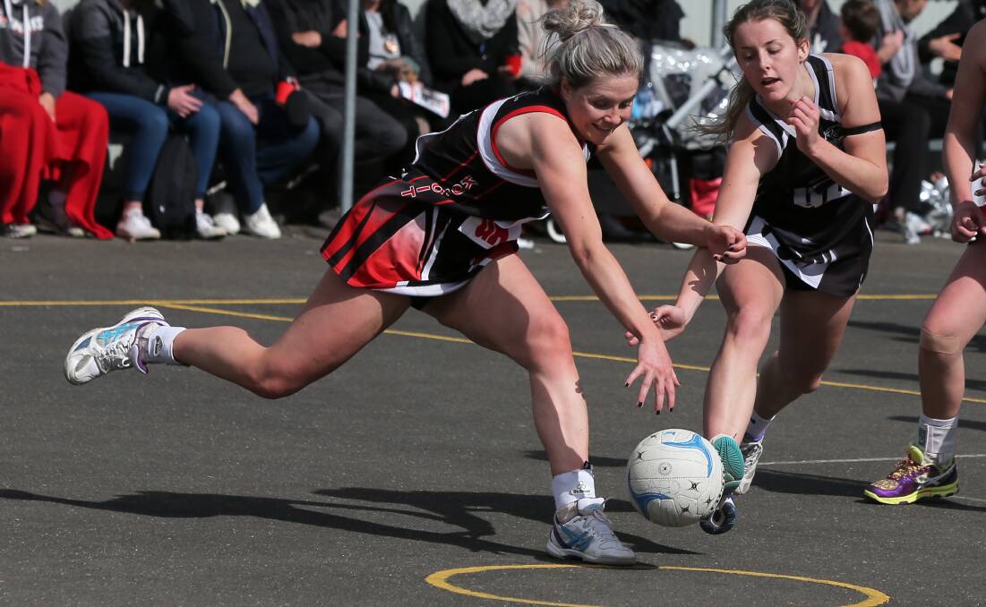 DETERMINED: Koroit goal attack Teagan Lang and Camperdown goal attack Jaymie Finch fight for the ball in the centre of the court. Picture: Rob Gunstone
