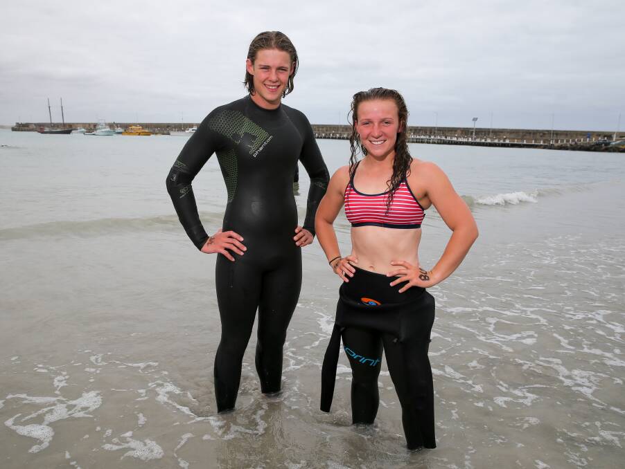 FRIENDLY RIVALS: Melbourne's Hamish Rowland and Warrnambool's Sophie Thomas were the first male and female swimmers home respectively on Sunday. 