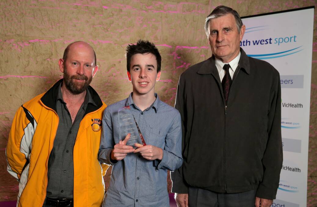 ACHIEVEMENT: Karl Keegan, Liam Keegan and Rob McCrabb accepted an trophy on behalf of Warrnambool Indoor Bowls.