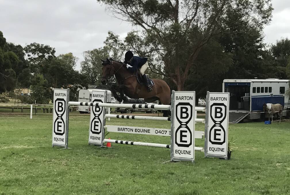 CLEAN SET OF HOOFS: Jess Barton on Celso produced two clear runs on her way to the Binnie Barclay Grand Prix title at Mortlake.
