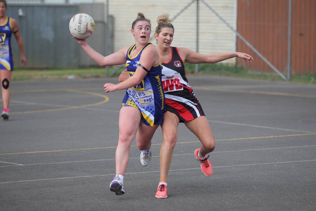 CRUNCH: North Warrnambool Eagles' Kate O'Meara and Koroit's Kasey Owen collide on Saturday. Pictures: Morgan Hancock