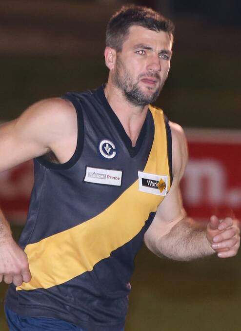 LEADER: Tigers coach Luke Crane slotted four goals against the Bloods.