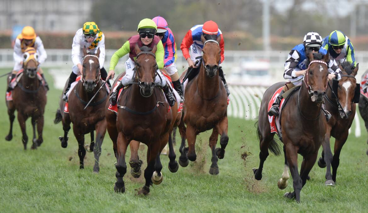 EYES FOR THE FINISHING LINE: Jockey Linda Meech on Bons Away at Caulfield on Saturday. Pictures: AAP
