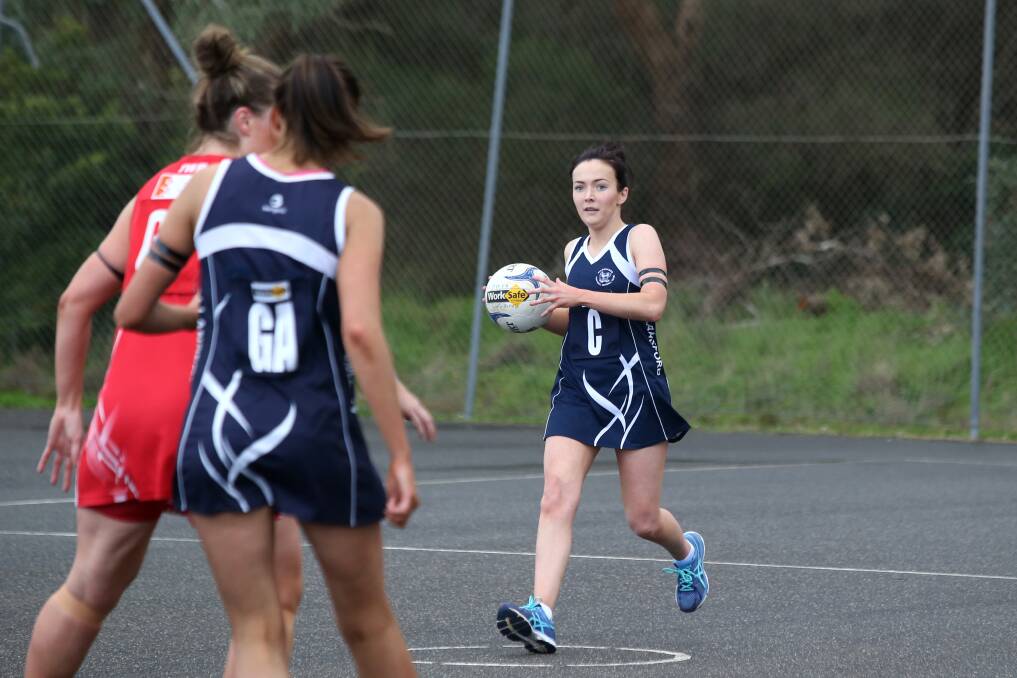 READY: Allansford centre Bridget Foster prepares to dish the ball off to a Cats' teammate during their loss to Dennington on Saturday. Picture: Amy Paton