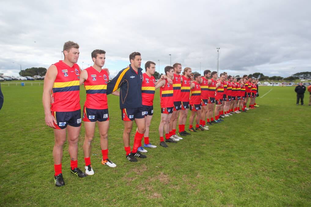 LEAGUE PRIDE: Warrnambool and District league players line up before their interleague clash in May. Picture: Morgan Hancock