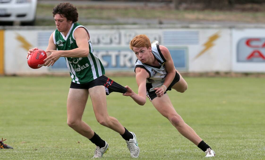 BIG OPPORTUNITY: Willem Drew, pictured chasing Naish McRoberts during a North Ballarat Rebels' practice match, will trial for Vic Country.