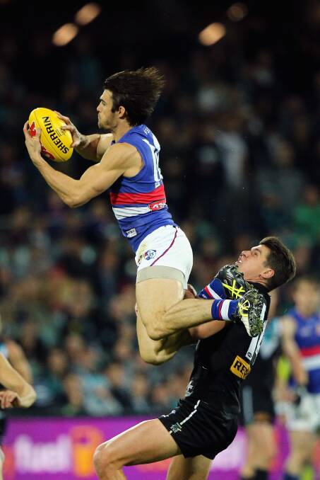 FLYING: Camperdown export Easton Wood is in career-best form for Western Bulldogs. Picture: Getty Images