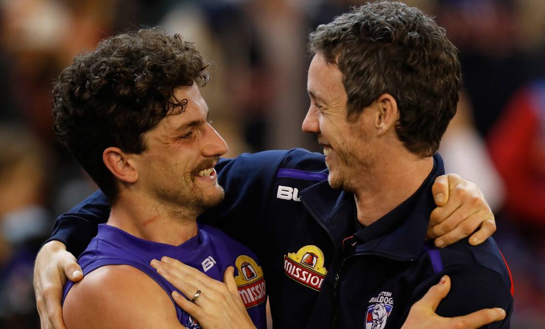 BULLDOG THROUGH AND THROUGH: Injured Western Bulldogs skipper Bob Murphy (right) with Tom Liberatore. Picture: Getty Images