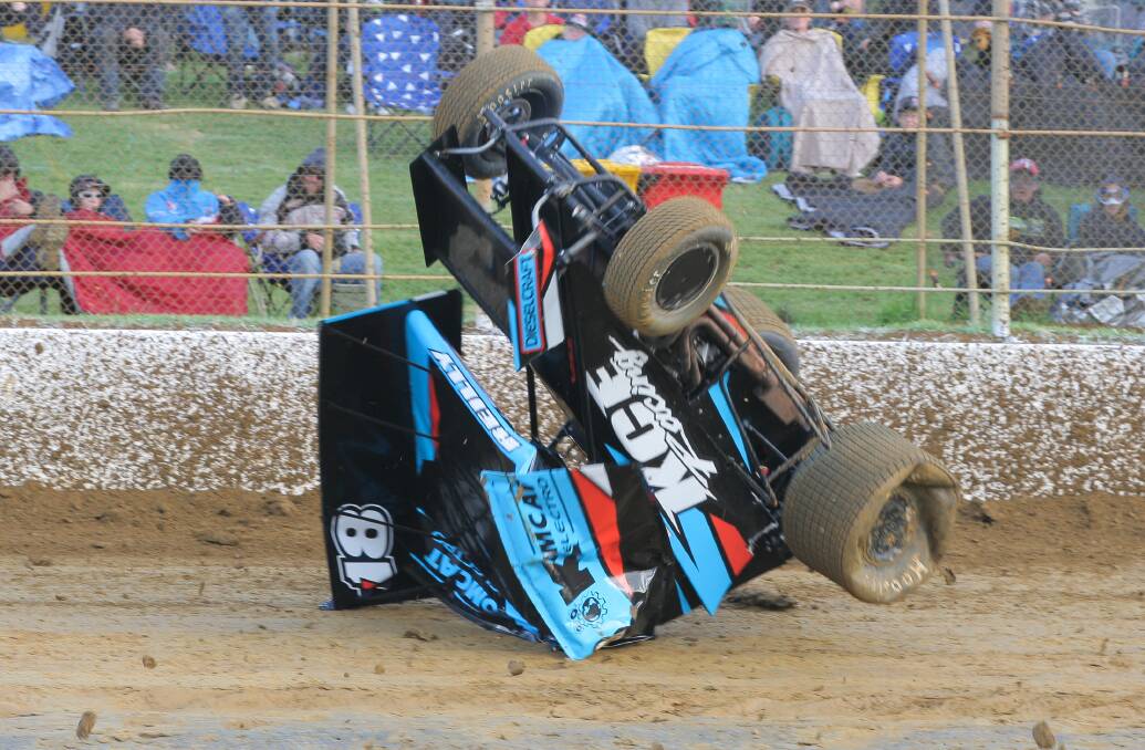CRASH CARNAGE: Scott Reilly crashes out of a heat on the opening night of the Grand Annual Sprintcar Classic on Friday. Pictures: Morgan Hancock