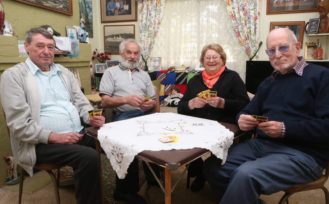 MEMORY LANE: Long-time Panmure residents Paul McGinness, Don Clarke, Barbara Olson and Don Olson used to fundraise for the Panmure Sprint during the Melbourne to Warrnambool by playing cards. Picture: Amy Paton
