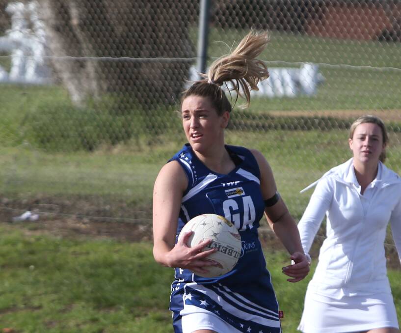 ON SONG: Warrnambool netballer Amy Wormald was the Blues' best on Saturday. She then played two games of Big V basketball in a jam-packed weekend. 