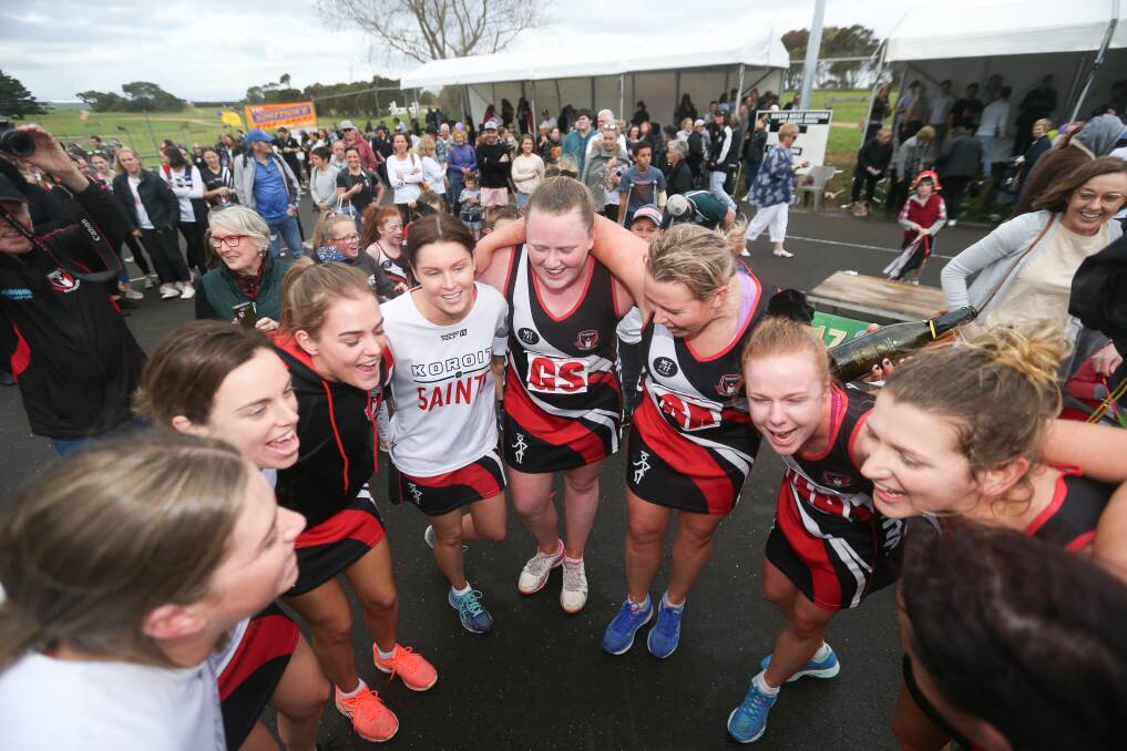 SAINT-SATIONAL: Koroit sings the song after winning the Hampden open grade netball flag on Saturday. Picture: Morgan Hancock
