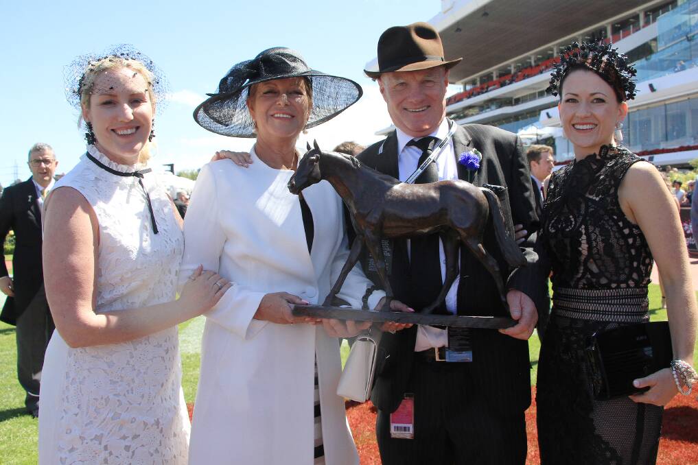 FAMILY CONNECTIONS: Warrnambool's Stacey, Janice McKenna, Colin and Fiona McKenna with the $1.5 million Coolmore Stud Stakes trophy.