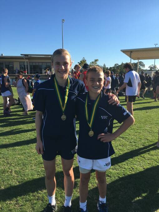 BIG V WINNERS: Warrnambool-based footballers Renee Saulitis and Will White represented Victoria at under 15 and under 12 levels respectively at national championships in Queensland.