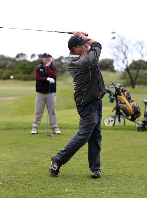 WIND FACTOR: Rob Smyth tees off in the blustery conditions during round two of the Warrnambool Golf Club championships on Saturday. The weather impacted players' scores. Picture: Amy Paton