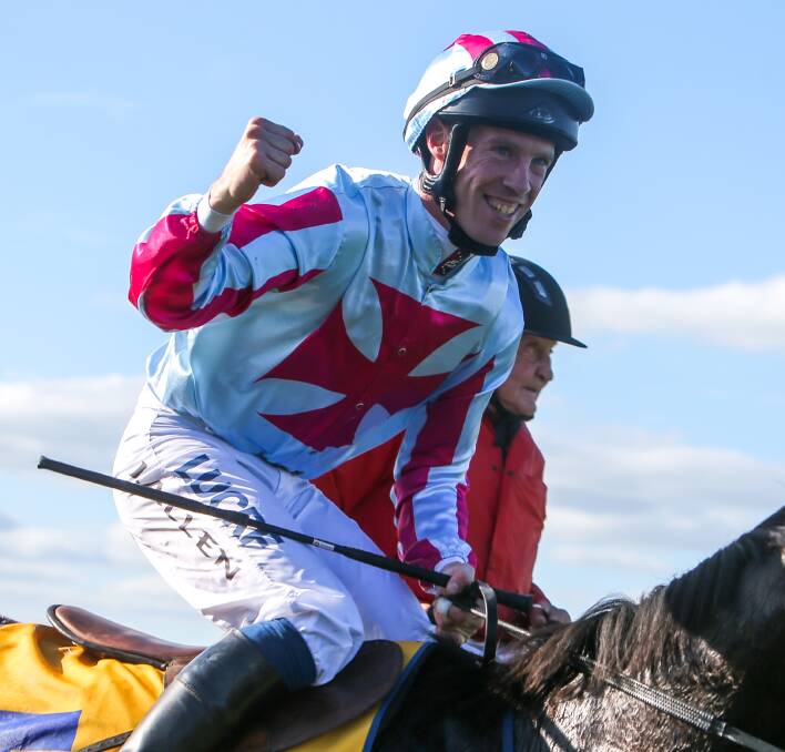 PROUD AS PUNCH: John Allen was pumped to win his second Grand Annual Steeplechase on Thursday. 