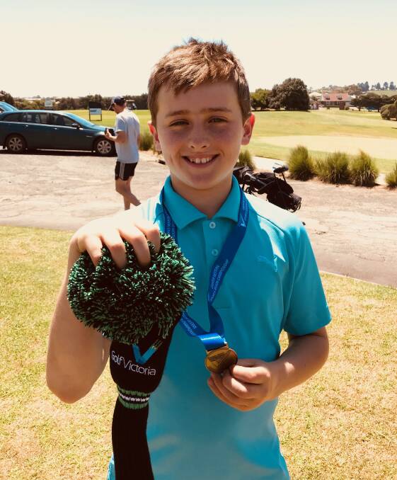 ACE: Port Fairy golfer Eric Smith with his SSV regional victory spoils.