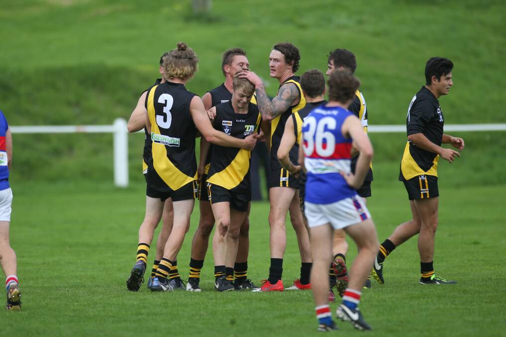 CELEBRATIONS: Merrivale players congratulate Jyron Neave after he kicked a goal in the Tigers' drubbing of Panmure. Picture: Morgan Hancock