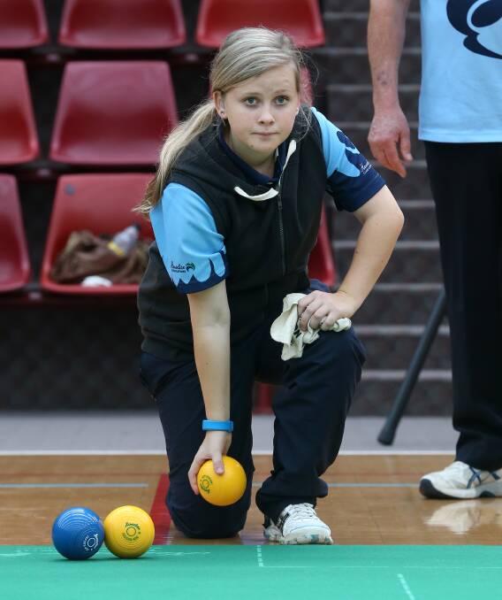 CONCENTRATION: Tiffany Brodie is not letting her deafness prevent her from making a mark in bowls. The 17-year-old is representing Victoria at Australian indoor bias bowls championships this week. Picture: Vicky Hughson