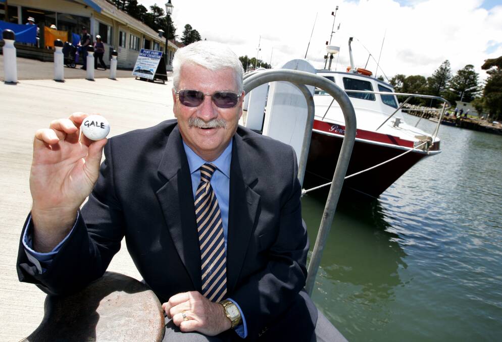 NAME ON IT: Ken Gale back in December 2007, showing the ping pong ball with his name on it that was drawn out to lift him to the role of Moyne Shire Council mayor. 