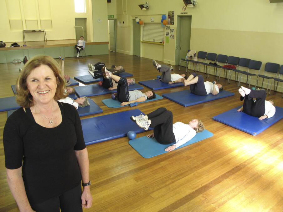 Keeping fit: Carole Manifold with her Pilates class back in 2008, just after her husband Roger passed away from kidney cancer.