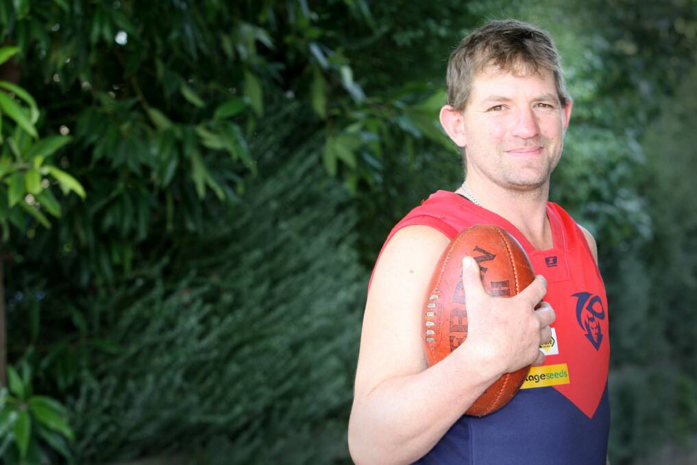 MARATHON MAN: Timboon Demons' Paul Fowler, pictured ahead of his 300th game in 2011, is now preparing for his 400th match.