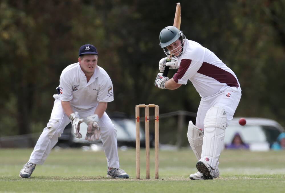 OLD FOES: Mortlake's Tyler Schafer and Bulls' Dave Murphy playing in the 2013-14 SWC grand final.
