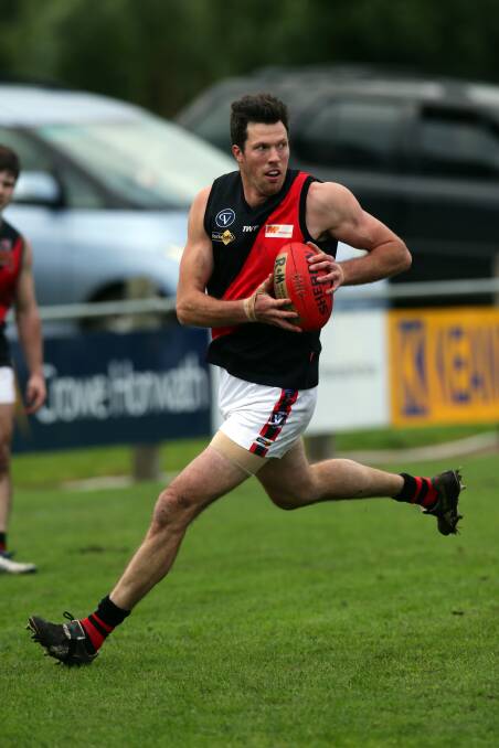 HE'S BACK: Paul Hinkley, pictured playing for the Bombers in 2014 - his most recent season at the club - will return as an assistant coach next year.