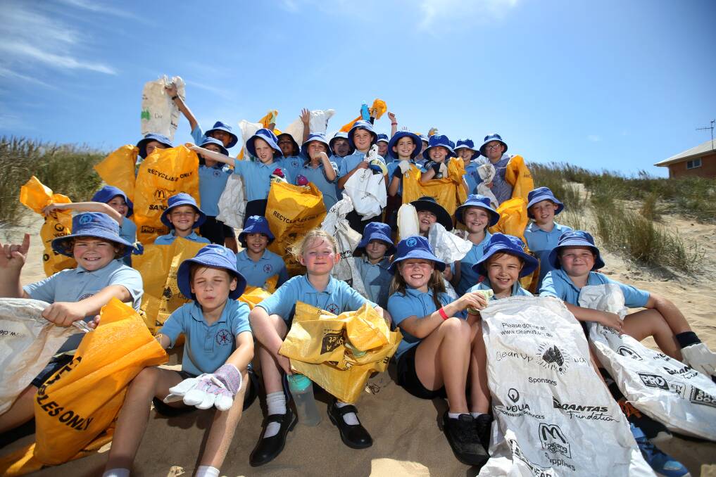 GREAT WORK: Warrnambool East Primary School pupils helped to clean up Warrnambool's main beach last year as part of Clean Up Australia Day. Picture: Amy Paton