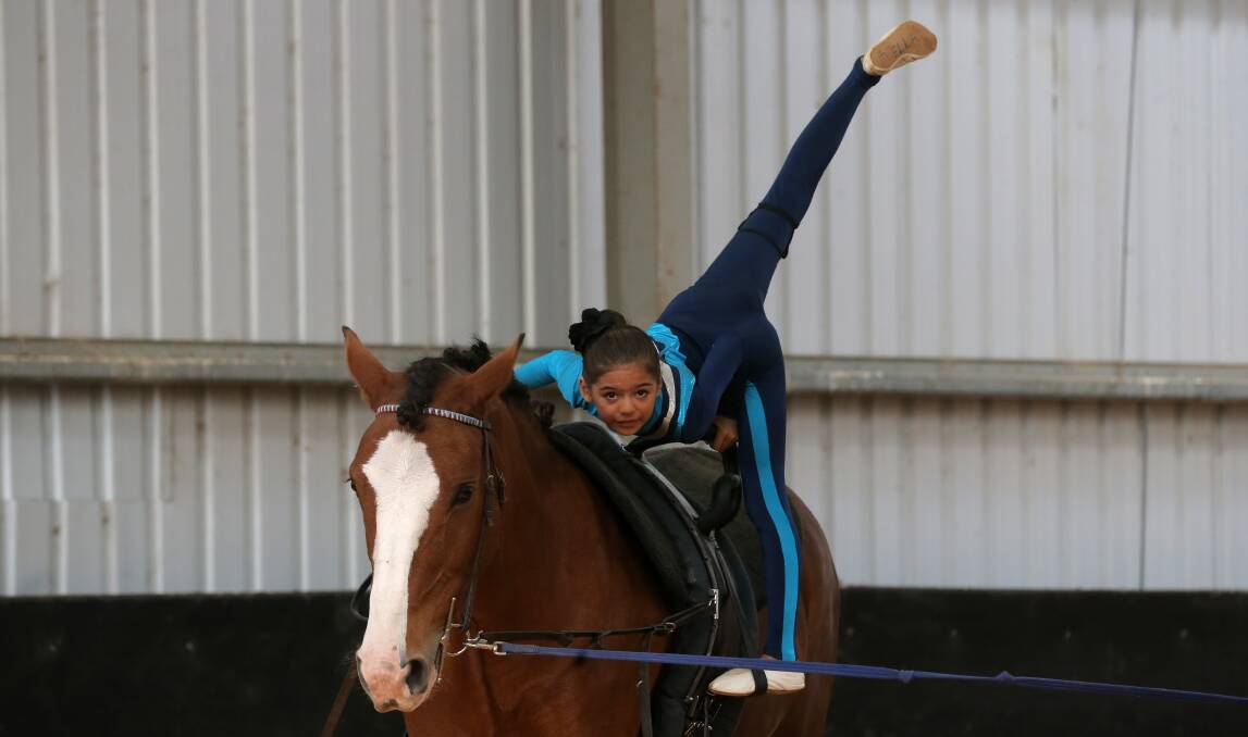 Skill: Tiara Barrett, from Woolsthorpe, takes part in last year's vaulting competition in Orford. The public is invited to this weekend's event that will attract competitors from across the state.