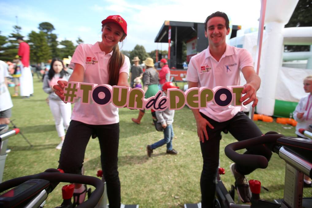 Riding for a good cause: Darcy Spinks and Jack Otter in the Powercor energy tent at last year's Tour de Depot community event at Lake Pertobe.