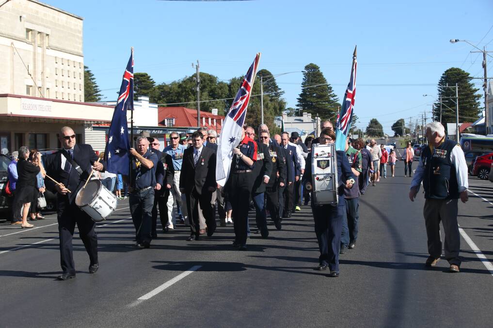 A DAY TO REMEMBER: Commemorative services and marches, such as this one in Port Fairy last year, will be held around the south-west to honour Anzac Day. 