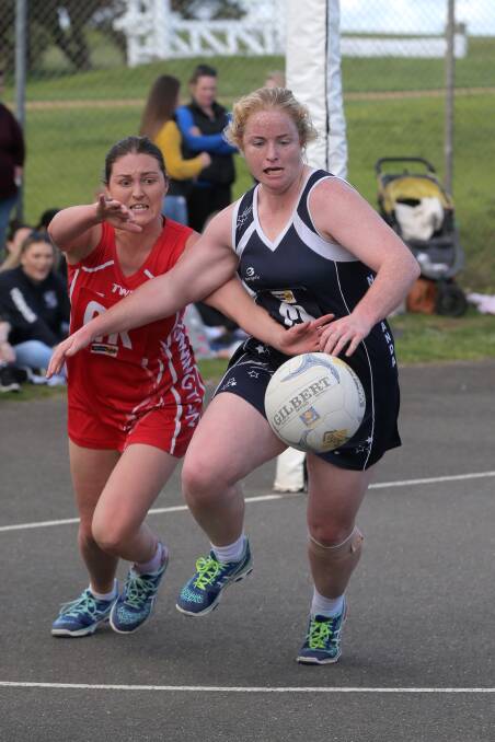 SWAPPING PLACES: Nirranda coach Steph Townsend, pictured racing Dennington's Melissa Burt to the ball in last year's preliminary final, has led her charges to the top of the WDFNL ladder after round 11.