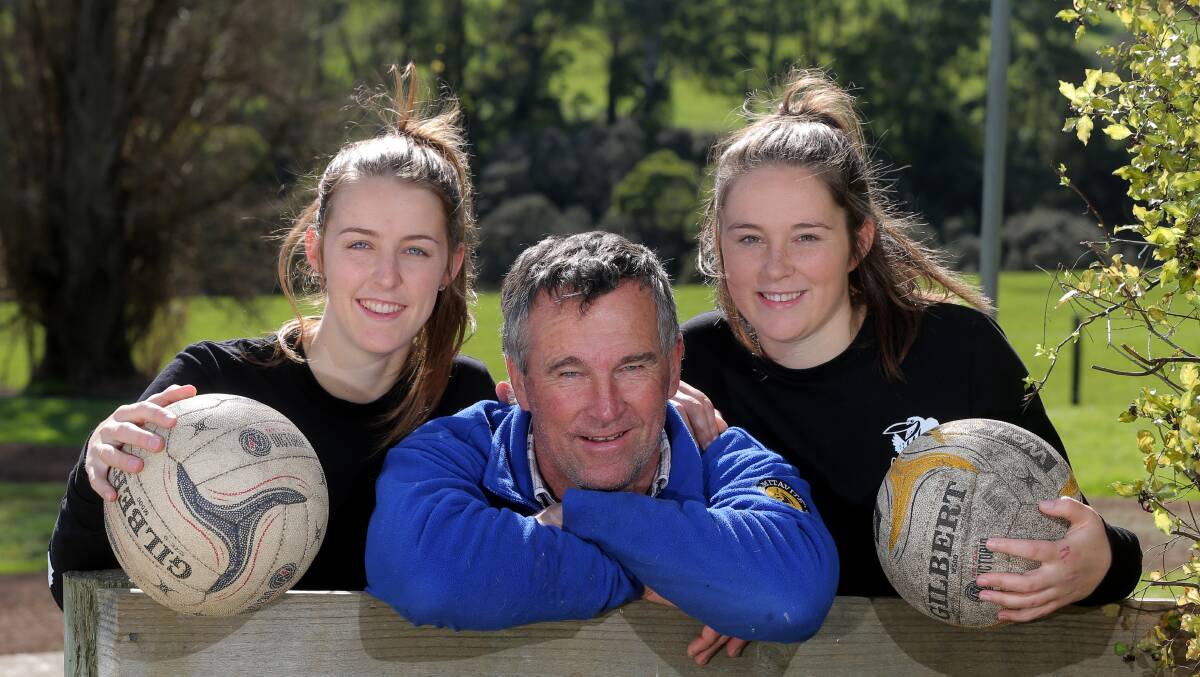 HOMECOMING: Jaymie Finch (left), Emily Finch (right) with their father Peter Finch. Both girls have made the move from Camperdown to Cobden. Picture: Rob Gunstone