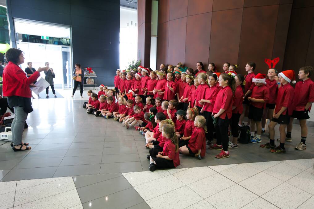 Pitch perfect: Mortlake P-12 students sing Christmas carols for the patients and staff at the Warrnambool Base Hospital. Picture: Rob Gunstone