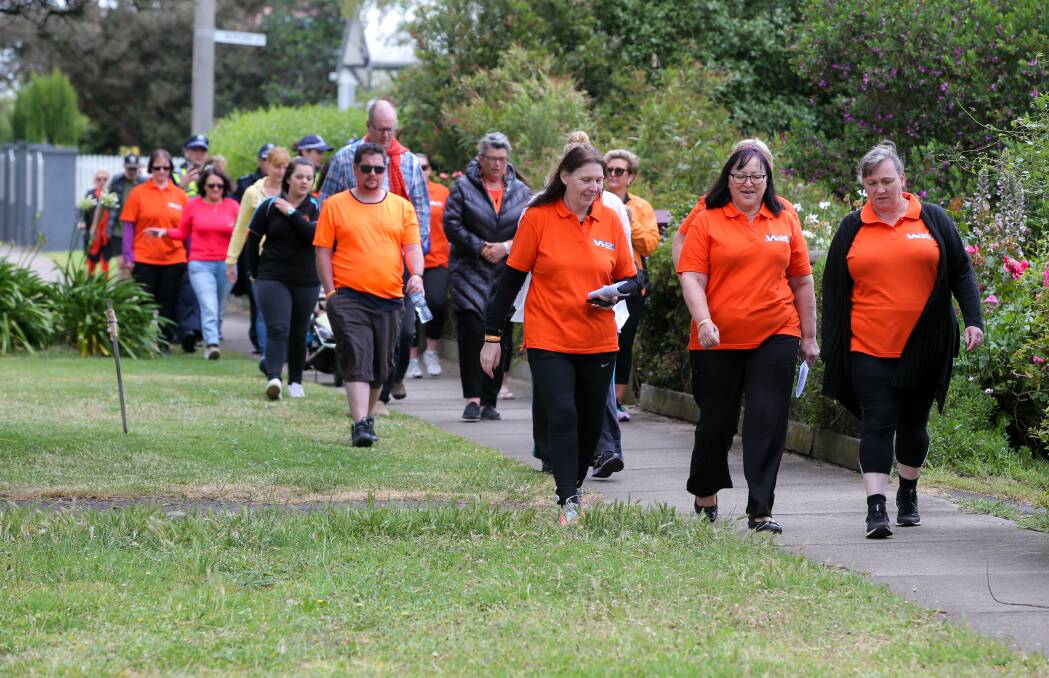 Standing strong: Staff and supporters from domestic violence service Emma House take part in a walk against violence through Warrnambool. Picture: Rob Gunstone