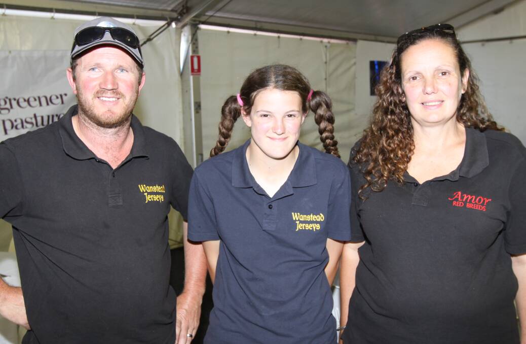 Working through it: Roger, Tayla and Amanda Heath of Wanstead Jerseys at Bookar at the 2017 Sungold Field Days. They were upbeat about the industry's future despite its setbacks.