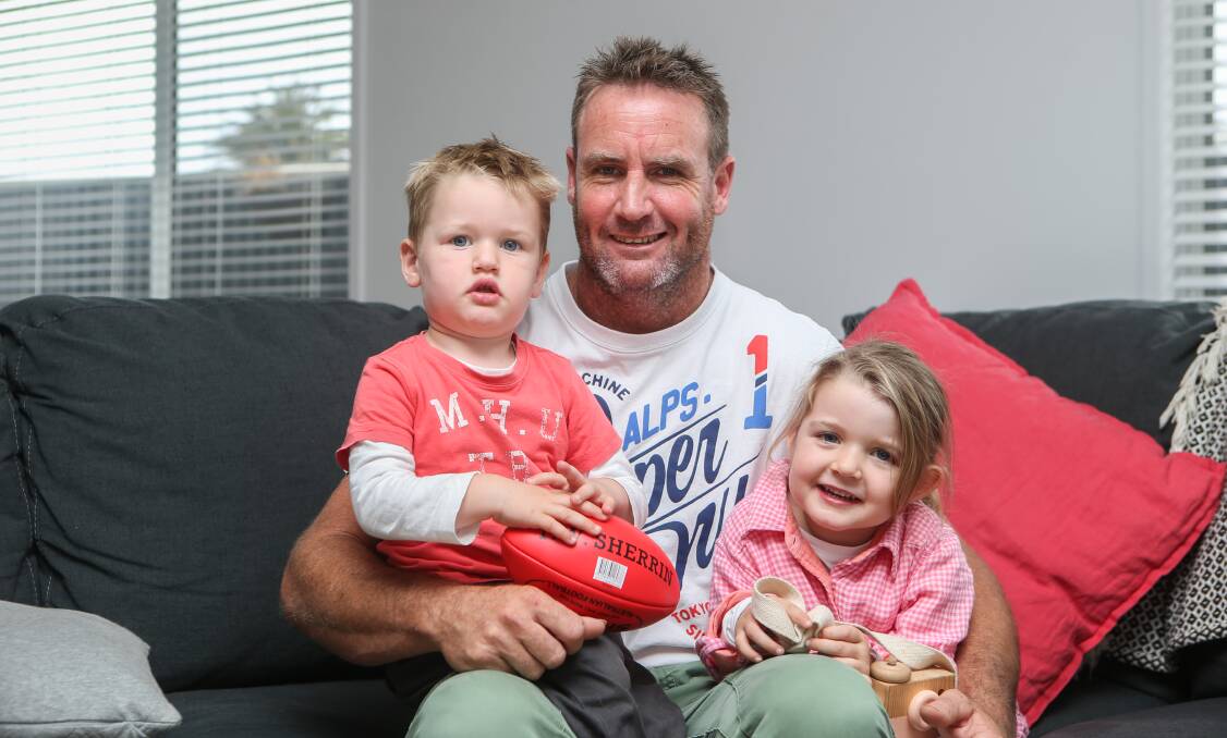 OUTSTANDING: Frankie Matthews - pictured with children Charlie, 2, and Ayla, 4 - was named in the Waratah Team of the Century. Picture: Amy Paton