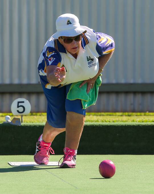 EYE-CATCHING: Warrnambool Gold skipper Brenda Hawker finishes off the end for her team during Tuesday's preliminary final against Koroit Orange. Pictures: Rob Gunstone