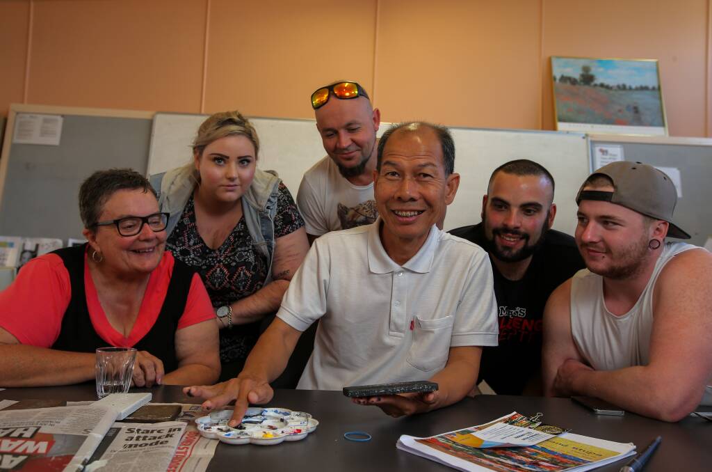 WELCOME BACK: Visiting Thai artist Dr Kanaid Silsat shows off his art techniques to South West Victorian SEAL Inc. students and teachers. Picture: Rob Gunstone