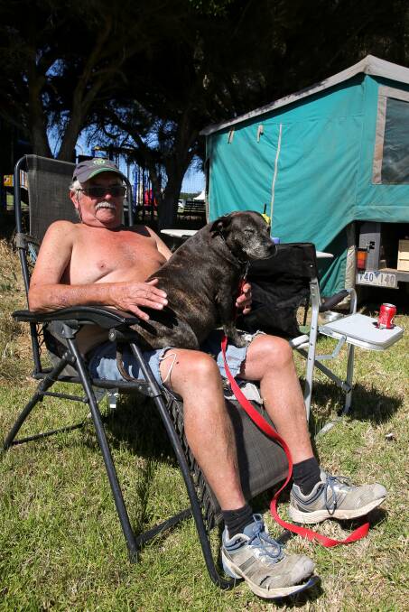 Ready: Lilydale's Kevin Cuffe and his dog Bunty were in the line for a camp site at 8am on Friday morning ahead of the Terang Music Festival. It started on Friday night and continues across the weekend. Picture: Rob Gunstone