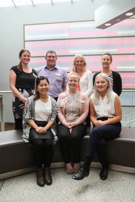 TOGETHER: South West Healthcare social work and counselling team (back L-R) Katie Webster, James McInnes, Helen Chapman, Mel Walker, (front L-R) Jen Duong, Jayne Hatherall and Kate Smith. Picture: Amy Paton
