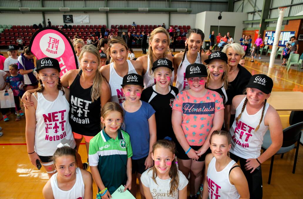 Well-known players Sarah Wall, Kim Ravaillion, Liz Watson, Ash Howard, and coach Norma Plummer with some of the local netballers who attended the Net Fit Netball Neon event. Picture: Rob Gunstone